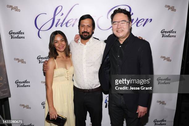 Malou Kamradt, Randal Kamradt and Chris Chan Lee attend the "Silent River" Opening Night Theatrical Premiere at Laemmle Glendale on October 13, 2022...