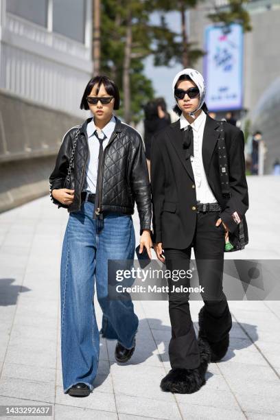 Guests wear a leather jacket, white shirt with tie, denim jeans with boots and a black jacket, head scarf with white shirt, black pants, fur shoes...