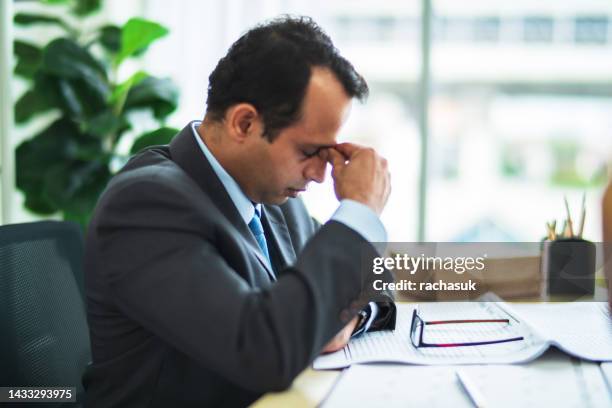 businessman sad feeling stressed at work - mistake stock pictures, royalty-free photos & images