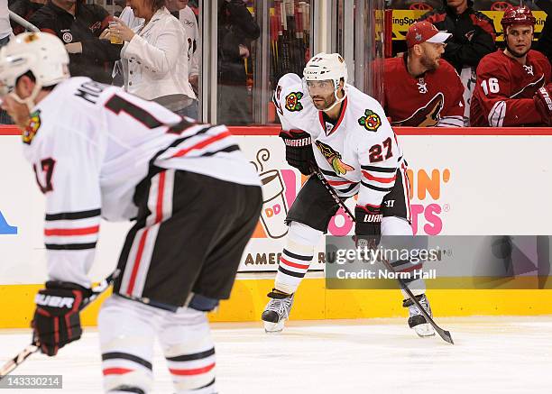 Johnny Oduya of the Chicago Blackhawks gets ready during a faceoff against the Phoenix Coyotes in Game Five of the Western Conference Quarterfinals...