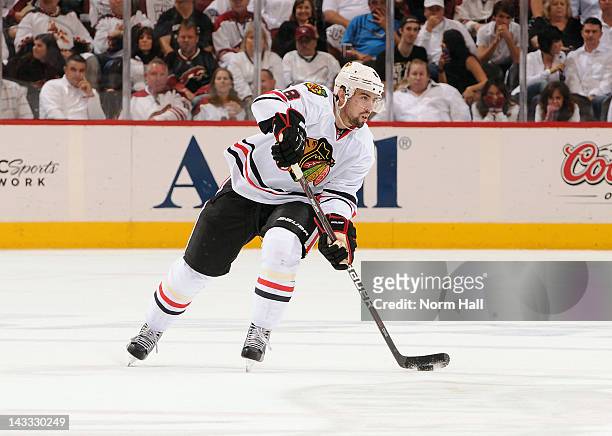 Nick Leddy of the Chicago Blackhawks skates with the puck against the Phoenix Coyotes in Game Five of the Western Conference Quarterfinals during the...