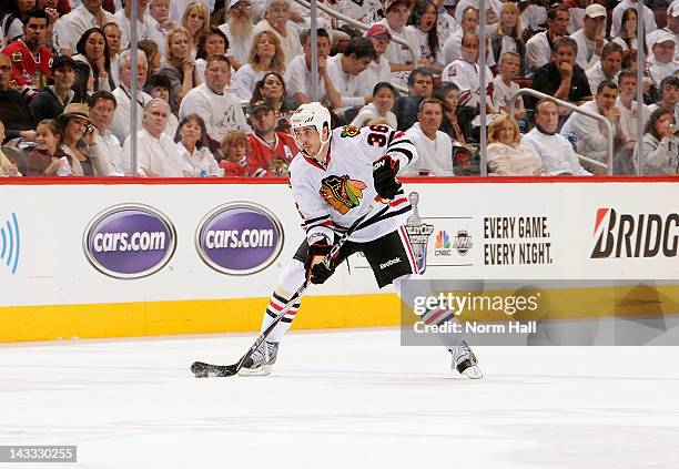 Dave Bolland of the Chicago Blackhawks skates the puck up ice against the Phoenix Coyotes in Game Five of the Western Conference Quarterfinals during...