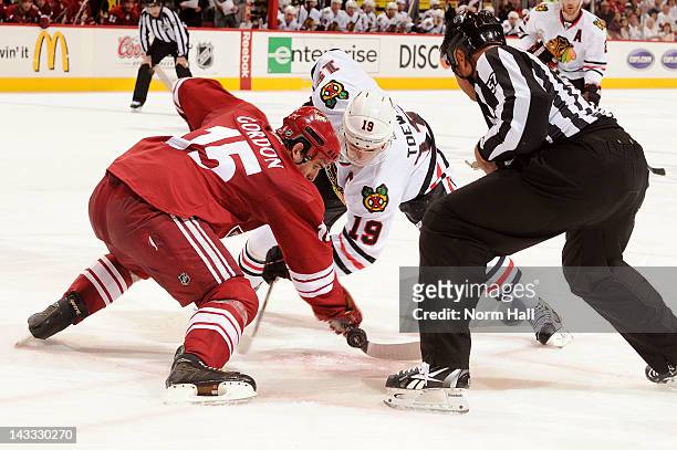 Boyd Gordon of the Phoenix Coyotes wins a faceoff against Jonathan Toews of the Chicago Blackhawks in Game Five of the Western Conference...