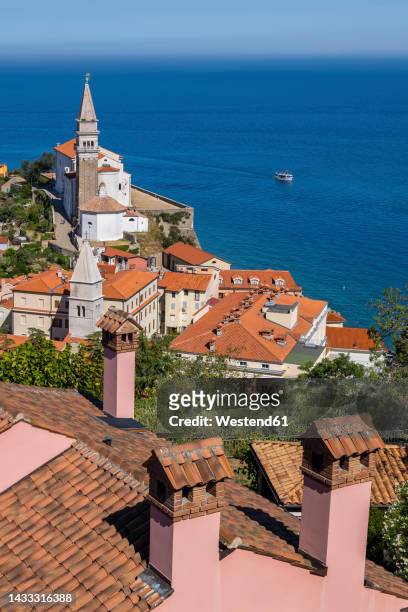 slovenia, piran, rooftops of coastal town - piran slovenia stock pictures, royalty-free photos & images