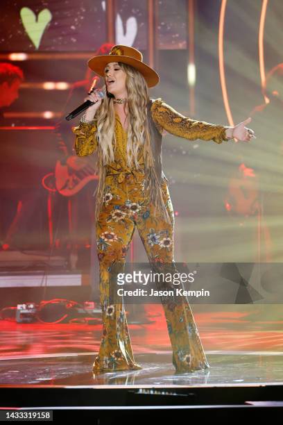 In this photo released on October 14 Lainey Wilson performs onstage during the 2022 CMT Artists of the Year at Schermerhorn Symphony Center on...