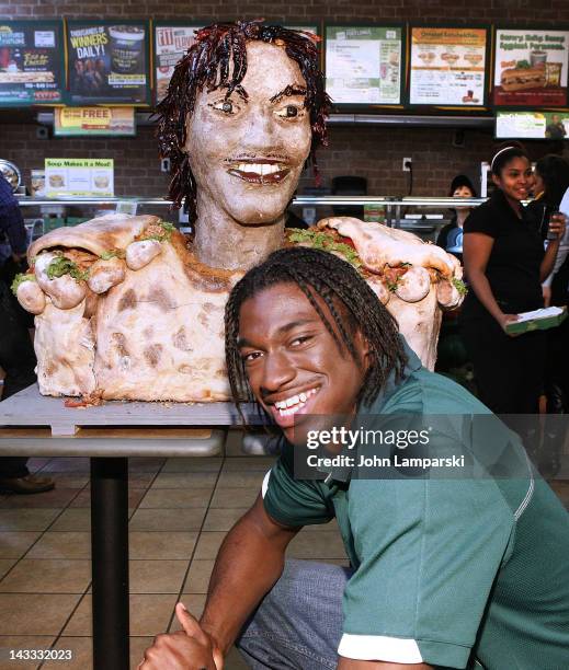 Robert Griffin III attends the unveiling of the Smokehouse BBQ Chicken statue at Subway Restaurant on April 24, 2012 in New York City.