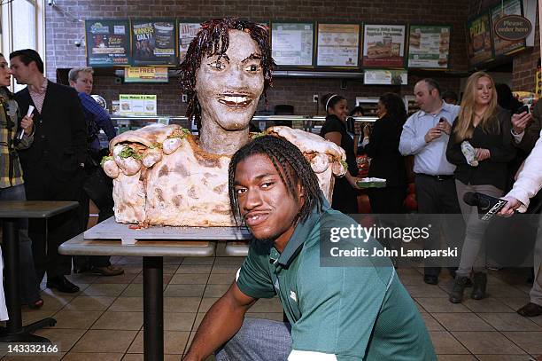 Robert Griffin III attends the unveiling of the Smokehouse BBQ Chicken statue at Subway Restaurant on April 24, 2012 in New York City.