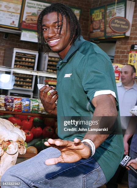 Robert Griffin III attends the unveiling of the Smokehouse BBQ Chicken statue at Subway Restaurant on April 24, 2012 in New York City.