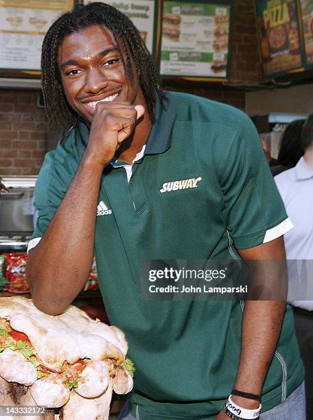 Robert Griffin III attends the unveiling of the Smokehouse BBQ Chicken statue at Subway Restaurant on April 24, 2012 in New York City.