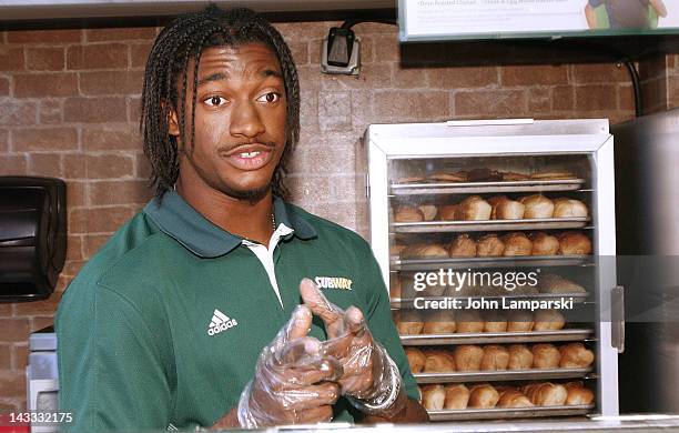 Robert Griffin III attends the unveiling of the Smokehouse BBQ Chicken statue at Subway Restaurant on April 24, 2012 in New York City.