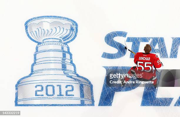 Sergei Gonchar of the Ottawa Senators skates over an NHL Stanley Cup Playoffs logo prior to a game against the New York Rangers in Game Three of the...