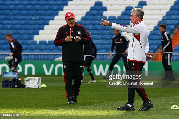 Head coach Jupp Heynckes of FC Bayern Muenchen issues instructions to his assistant coach Hermann Gerland during the training session, on the eve of...