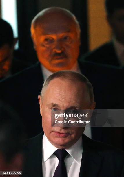 Russian President Vladimir Putin and Belarussian President Alexander Lukashenko arrive at the plenary session of the Commonwealth of the Independent...