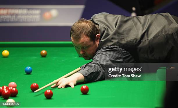 Stephen Lee of England in action in his match against Andrew Higginson of England during the first round of the Betfred.com World Snooker...