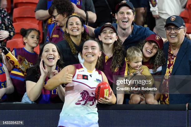 Mikayla Pauga poses for a photograph with fans after the round eight AFLW match between the Brisbane Lions and the Adelaide Crows at Metricon Stadium...