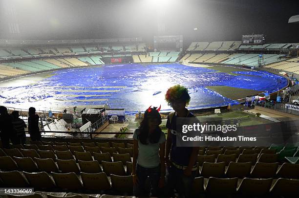 Tarp covers the soaked ground of Eden Garden after a heavy rain before the IPL 5 T20 cricket match between Kolkata Knight Riders and Deccan Chargers...