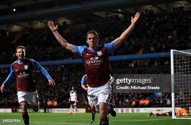 Stephen Warnock of Aston Villa celebrates scoring the opening goal during the Barclays Premier League match between Aston Villa and Bolton Wanderers...