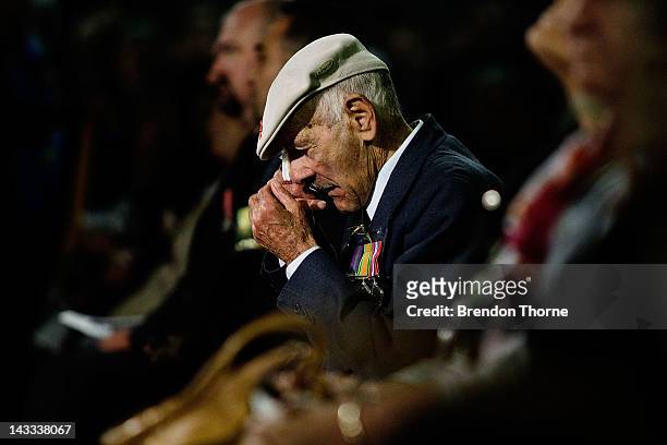 War veteran is brought to tears during the ANZAC Dawn Service at the Martin Place Cenotaph on April 25, 2012 in Sydney, Australia. Veterans,...