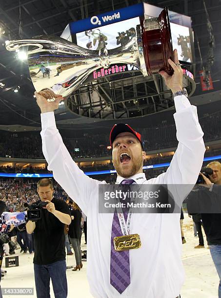 Stefan Ustorf of Berlin poses with the cup after winning the DEL final match between EHC Eisbaeren Berlin and Adler Mannheim at O2 World stadium on...