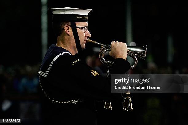 Serviceman plays the last post during the ANZAC Dawn Service at the Martin Place Cenotaph on April 25, 2012 in Sydney, Australia. Veterans,...