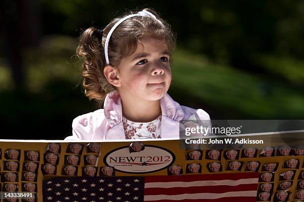 Catalina Salas of Charlotte, N.C. Waits for Republican presidential candidate, former Speaker of the House Newt Gingrich as he toured the Billy...