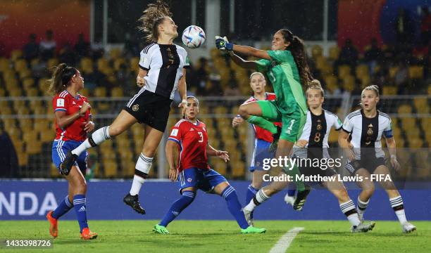 Maria Alber of Germany and Catalina Alvardo of Chile challenge for the ball during the Group B match between Germany and Chile of the FIFA U-17...