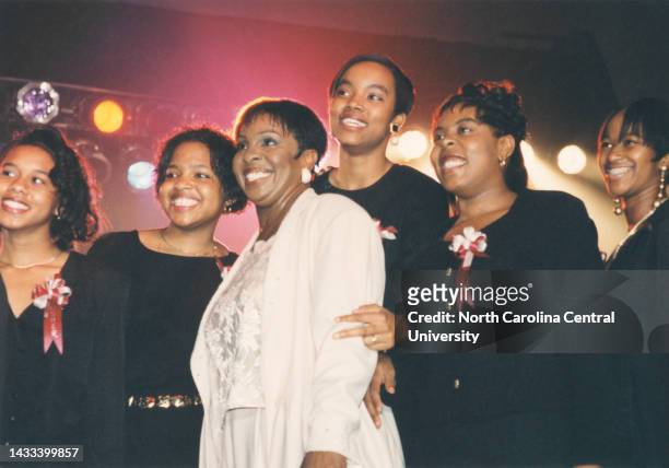 Singer - Songwriter Gladys Knight surrounded by members of the Alpha Chi Chapter of Alpha Kappa Alpha Sorority, Inc. In 1995 during North Carolina...