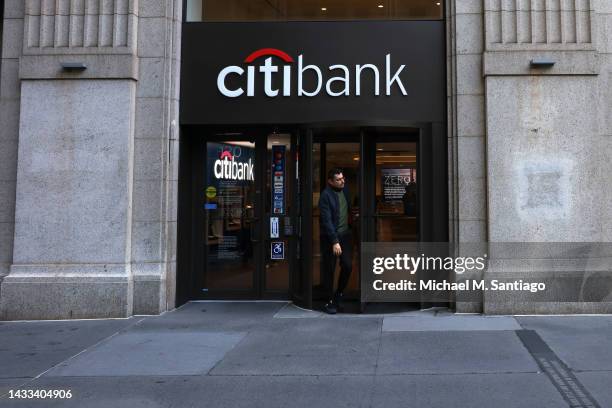 Person exits a Citibank on Broadway on October 14, 2022 in New York City. Citigroup announced that its third-quarter earnings fell 25% as its shares...