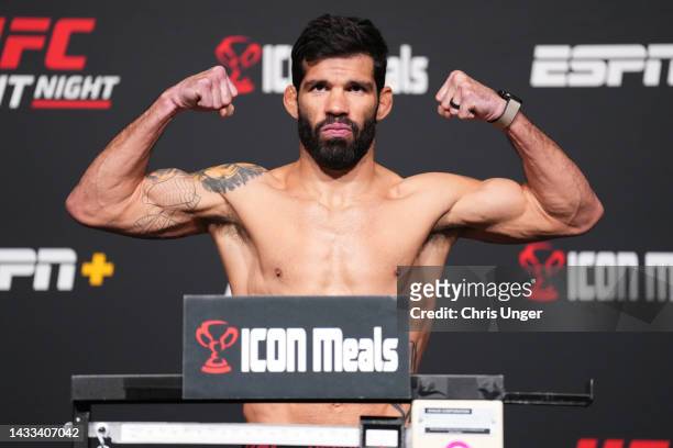 Raphael Assuncao of Brazil poses on the scale during the UFC Fight Night weigh-in at UFC APEX on October 14, 2022 in Las Vegas, Nevada.