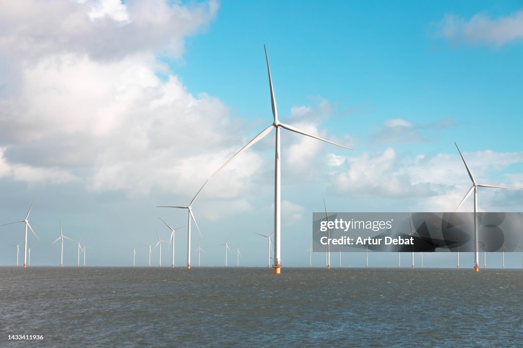 Offshore wind park with blue sky in the north of the Netherlands.