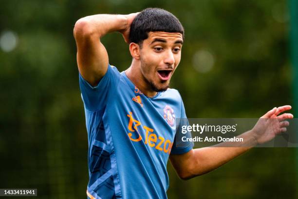 Zidane Iqbal of Manchester United in action during a first team training session at Carrington Training Ground on October 14, 2022 in Manchester,...