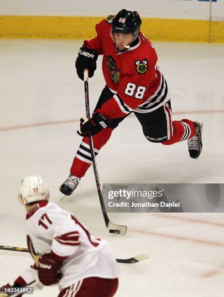 Patrick Kane of the Chicago Blackhawks shoots past Radim Vrbata of the Phoenix Coyotes in Game Six of the Western Conference Quarterfinals during the...