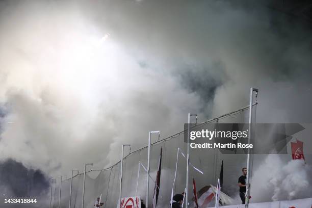 St. Pauli fans set off fireworks inside the stadium during the Second Bundesliga match between FC St. Pauli and Hamburger SV at Millerntor Stadium on...