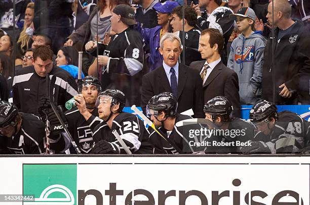 Los Angeles Kings head coach Darryl Sutter behind bench with players during game vs Vancouver Canucks at Staples Center. Game 3. Los Angeles, CA...