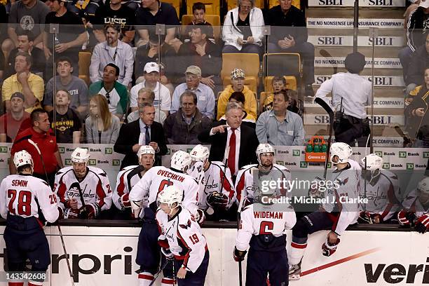 Washington Capitals head coach Dale Hunter behind bench with players during game vs Boston Bruins at TD Garden. Game 5. Boston, MA 4/21/2012 CREDIT:...