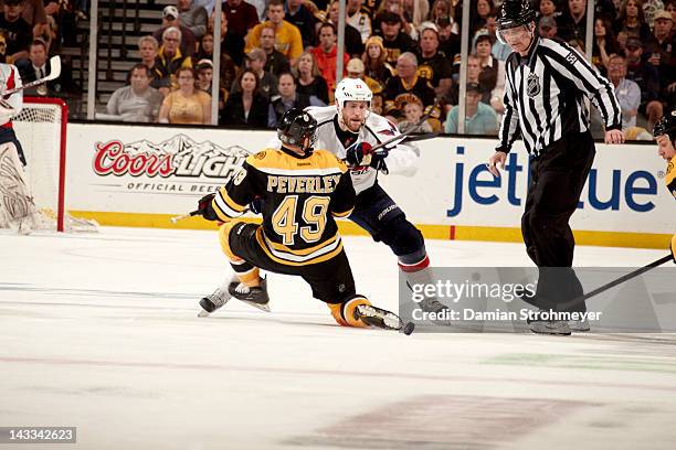 Washington Capitals Brooks Laich in action, faceoff vs Boston Bruins Rich Peverley at TD Garden. Game 5. Boston, MA 4/21/2012 CREDIT: Damian...