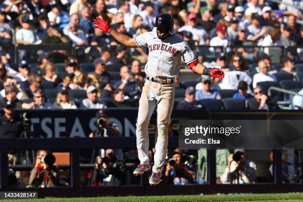 Amed Rosario of the Cleveland Guardians celebrates as he runs the bases after hitting a solo home run during the fifth inning against the New York...