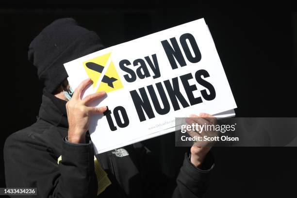 Anti-nuclear weapons activists demonstrate outside of the the Kluczynski Federal Building on October 14, 2022 in Chicago, Illinois. The demonstrators...