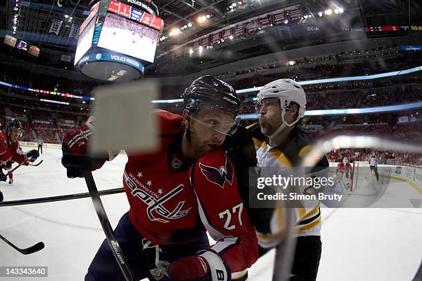 Closeup of Boston Bruins Brian Rolston in action, check vs Washington Capitals Karl Alzner at Verizon Center. Game 6. Washington, DC 4/22/2012...