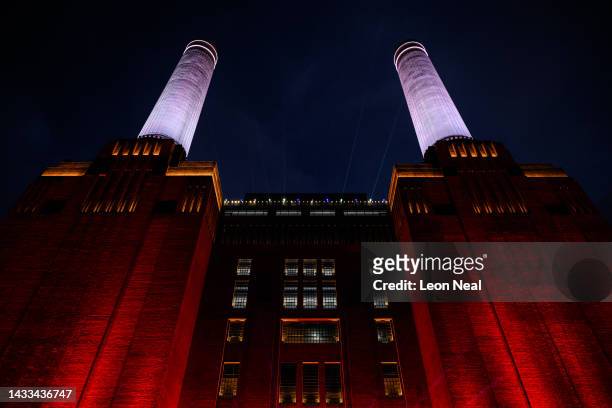 General view of the illuminated main building at Battersea Power station on October 14, 2022 in London, England. Battersea Power Station was built on...
