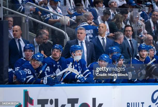 Assistant coaches Manny Malhotra, Dean Chynoweth, Spencer Carbery and head coach Sheldon Keefe of the Toronto Maple Leafs watch their team play the...