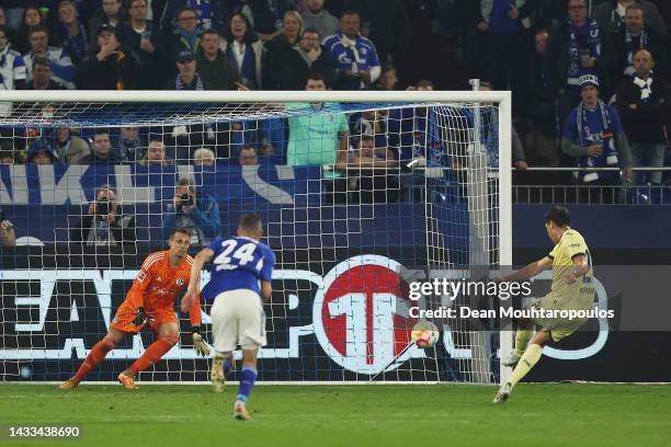 Robert Skov of TSG 1899 Hoffenheim scores their sides third goal from the penalty spot past Alexander Schwolow of FC Schalke 04 during the Bundesliga...