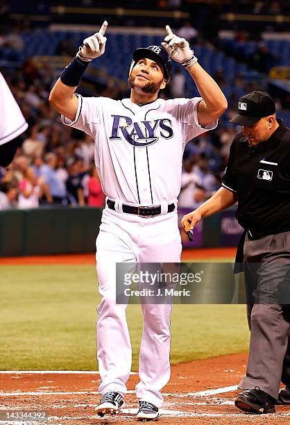 Designated hitter Luke Scott of the Tampa Bay Rays celebrates his home run against the Los Angeles Angels of Anaheim during the game at Tropicana...