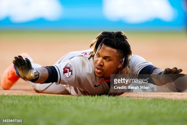 Jose Ramirez of the Cleveland Guardians reacts after reaching third base on a throwing error by Josh Donaldson of the New York Yankees during the...