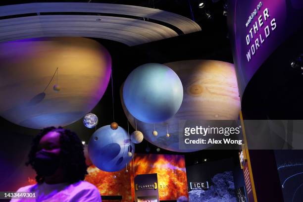 Visitor browses exhibit at the “Exploring the Planets” gallery at The Smithsonian National Air and Space Museum on its reopening on October 14, 2022...