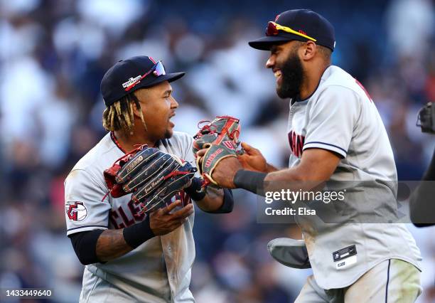 Jose Ramirez and Amed Rosario of the Cleveland Guardians celebrate defeating the New York Yankees 4-2 in ten innings in game two of the American...