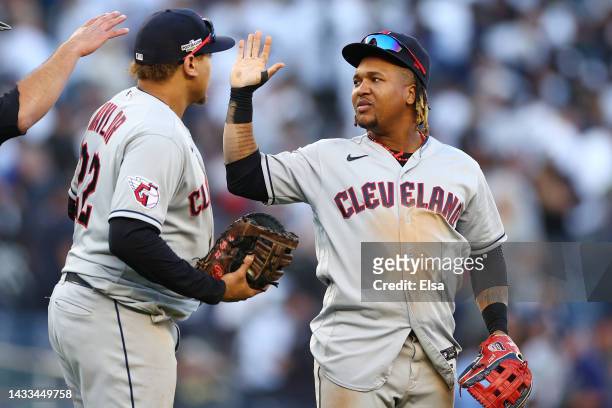 Jose Ramirez of the Cleveland Guardians and Josh Naylor celebrate defeating the New York Yankees 4-2 in ten innings in game two of the American...
