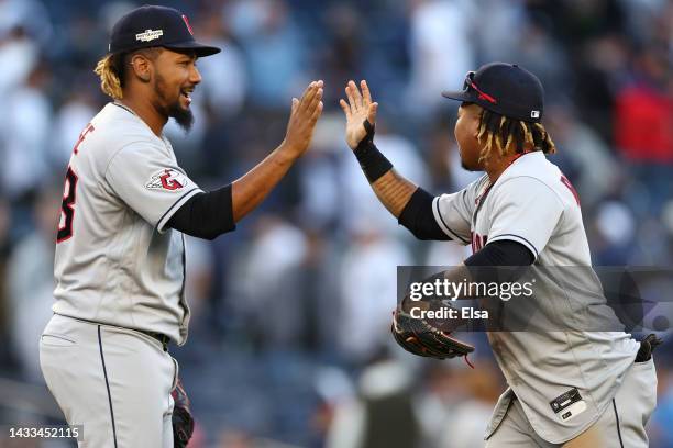 Emmanuel Clase of the Cleveland Guardians celebrates with Jose Ramirez after defeating the New York Yankees 4-2 in ten innings in game two of the...