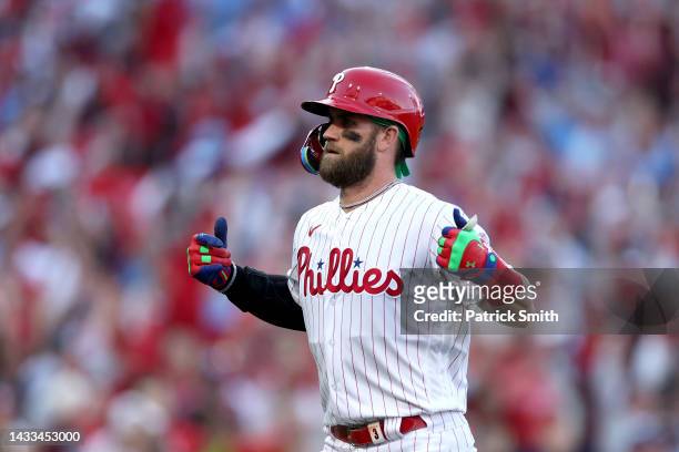 Bryce Harper of the Philadelphia Phillies celebrates after hitting a two run home run against the Atlanta Braves during the third inning in game...