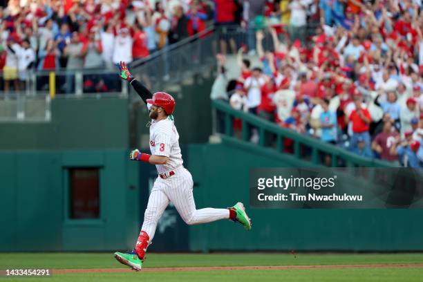 Bryce Harper of the Philadelphia Phillies rounds the bases after hitting a two run home run against the Atlanta Braves during the third inning in...